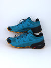 Salomon Speedcross 5 GORE-TEX men's trail running shoes in the black and green colorway.